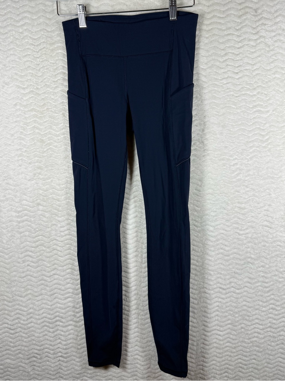 Lululemon Speed Up Tight Leggings in True Navy featuring side pockets